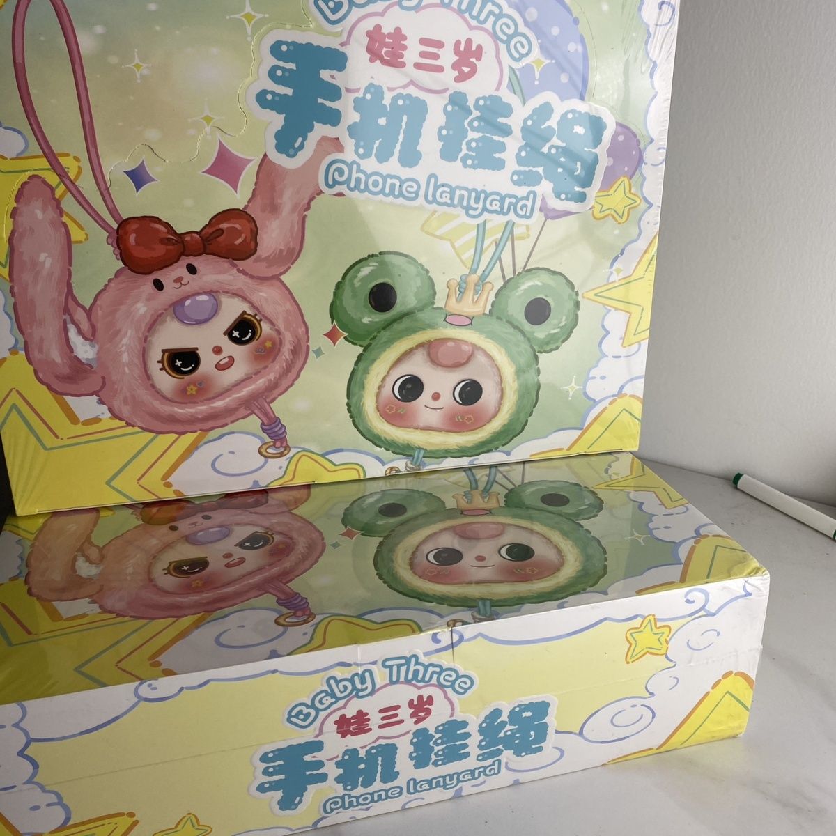 Baby Products In Sale - สายคล้องโทรศัพท์ Baby Three แบบกล่องสุ่ม ตุ๊กตาไวนิลหน้าตาน่ารัก ของสะสม